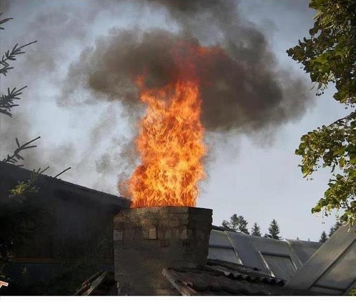 Fire coming out of a chimney